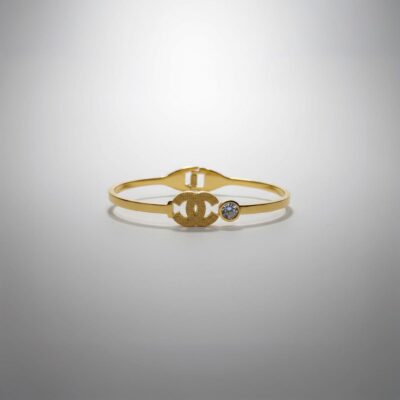 Elegant Gold Interlocking C Bangle with Rhinestone