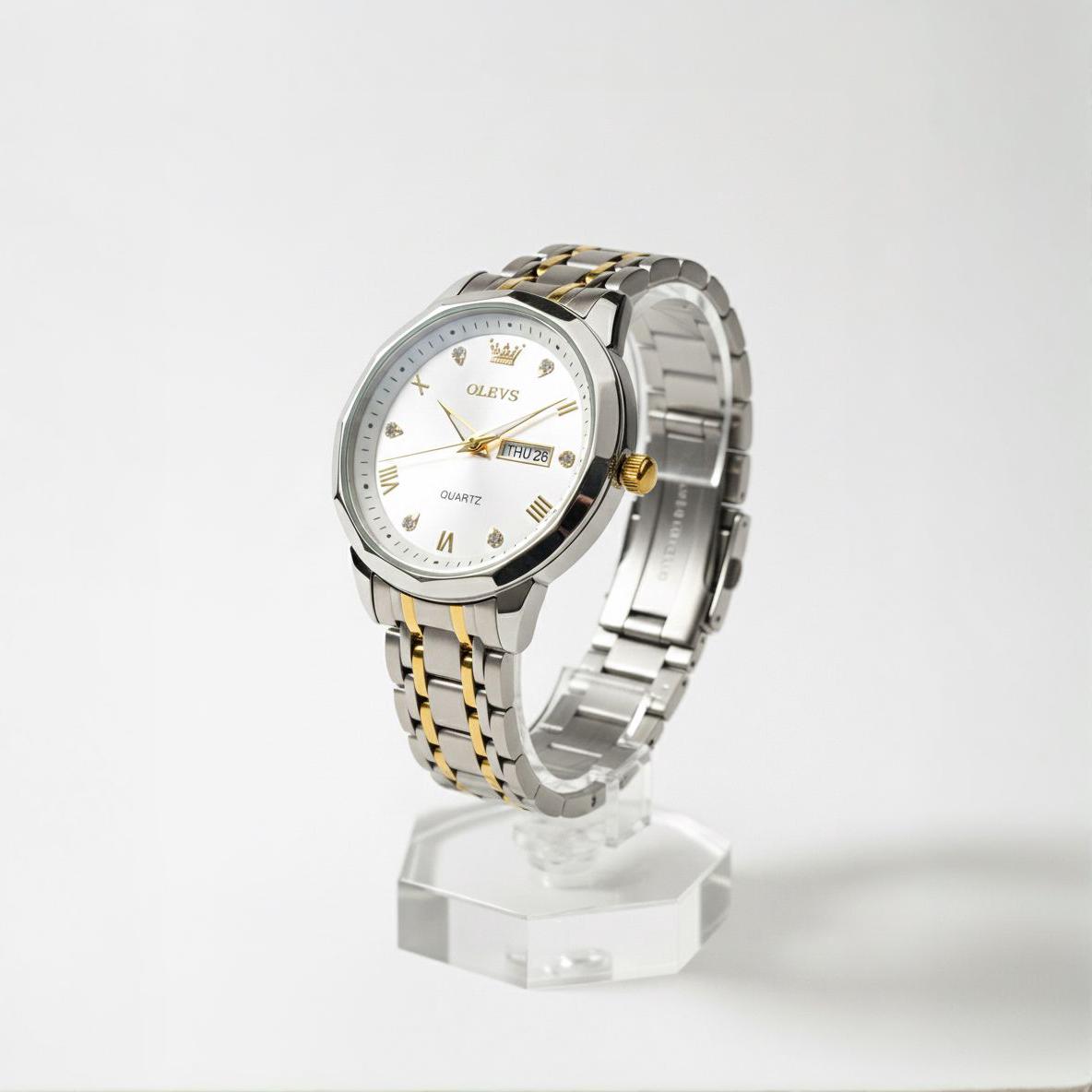 OLEVS men’s silver and gold quartz wristwatch with white dial, gold markers, and day-date display